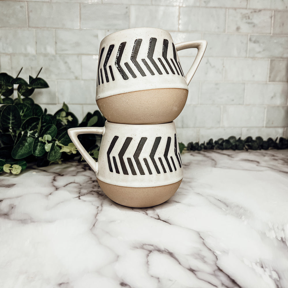 Unique and modern coffee mugs that are brown and ivory